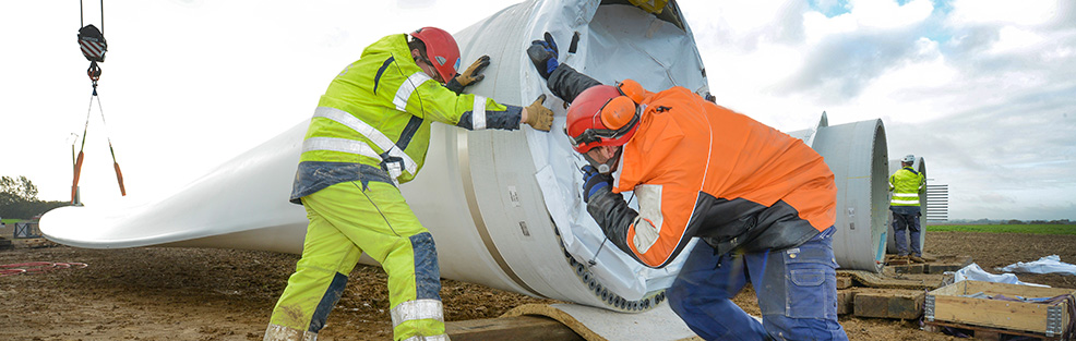 Green Jobs. Two workers wearing personal protection equipment.