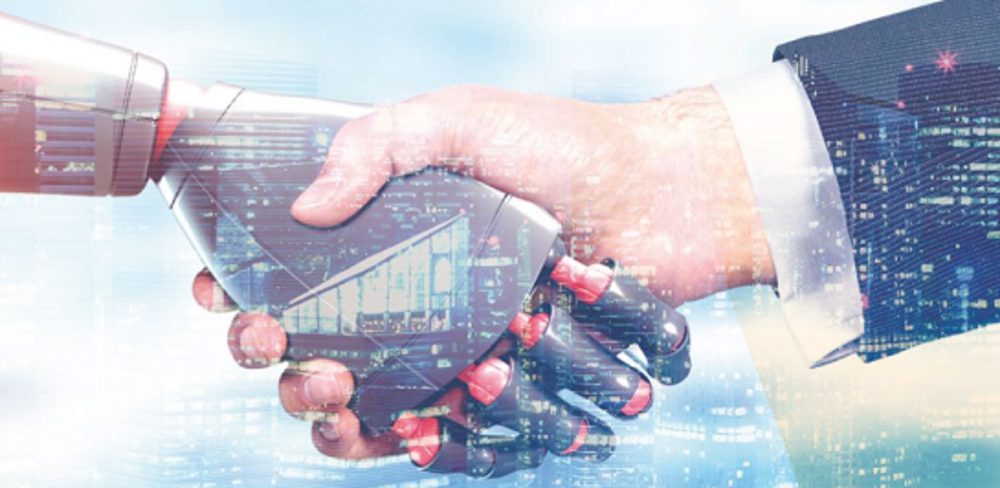 A human and a robotic hand shaking