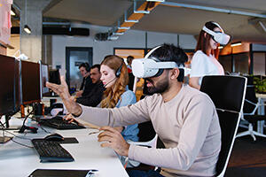 Man in VR glasses at work